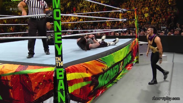 WWE_Money_In_The_Bank_2023_Rhea_Ringside_Attacks_Cody_1384.jpg