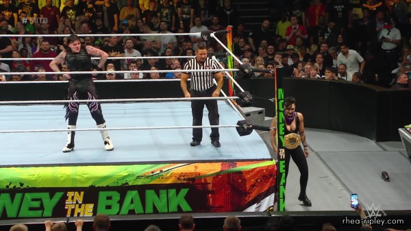 WWE_Money_In_The_Bank_2023_Rhea_Ringside_Attacks_Cody_1397.jpg