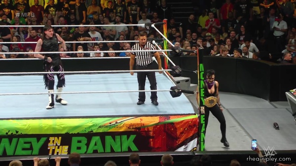 WWE_Money_In_The_Bank_2023_Rhea_Ringside_Attacks_Cody_1398.jpg