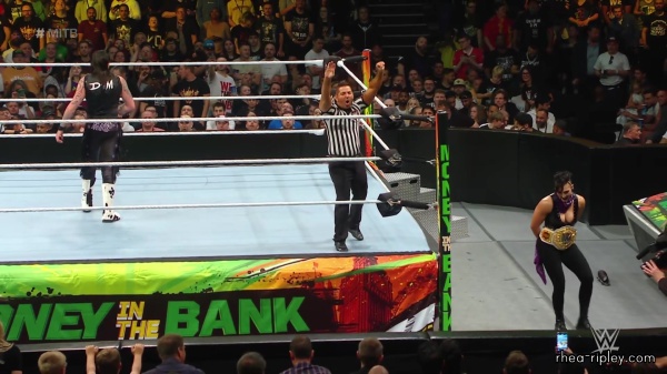 WWE_Money_In_The_Bank_2023_Rhea_Ringside_Attacks_Cody_1403.jpg