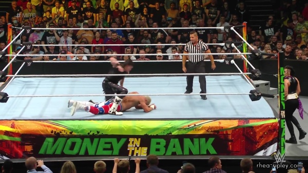 WWE_Money_In_The_Bank_2023_Rhea_Ringside_Attacks_Cody_1444.jpg