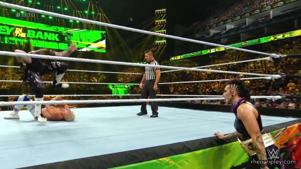 WWE_Money_In_The_Bank_2023_Rhea_Ringside_Attacks_Cody_1466.jpg
