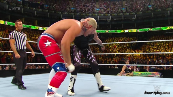 WWE_Money_In_The_Bank_2023_Rhea_Ringside_Attacks_Cody_1478.jpg