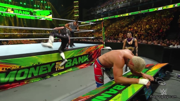 WWE_Money_In_The_Bank_2023_Rhea_Ringside_Attacks_Cody_1492.jpg