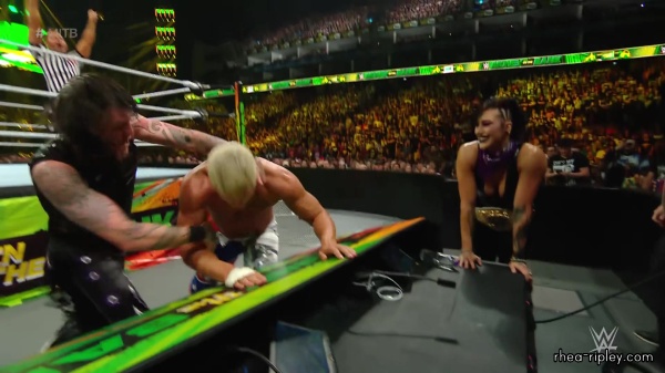 WWE_Money_In_The_Bank_2023_Rhea_Ringside_Attacks_Cody_1506.jpg