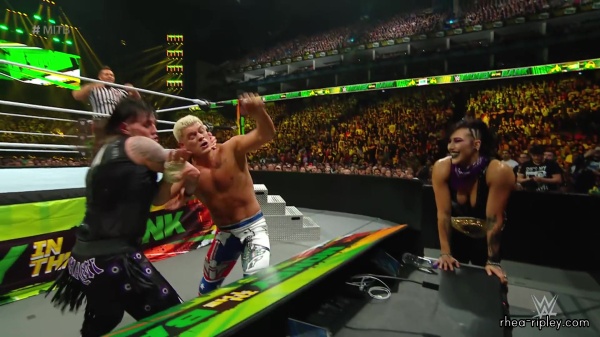 WWE_Money_In_The_Bank_2023_Rhea_Ringside_Attacks_Cody_1507.jpg