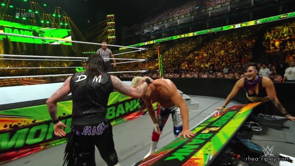 WWE_Money_In_The_Bank_2023_Rhea_Ringside_Attacks_Cody_1517.jpg