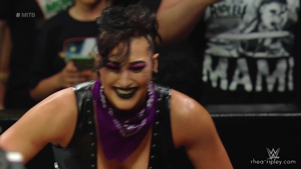 WWE_Money_In_The_Bank_2023_Rhea_Ringside_Attacks_Cody_1520.jpg