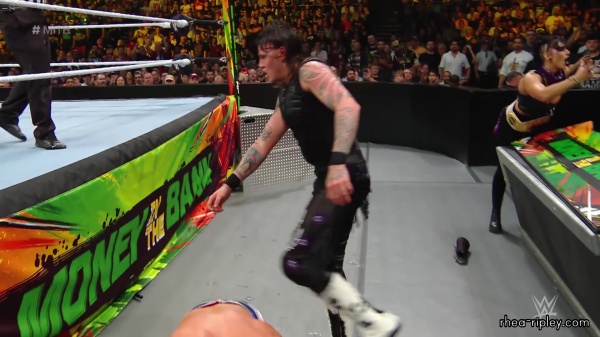 WWE_Money_In_The_Bank_2023_Rhea_Ringside_Attacks_Cody_1526.jpg