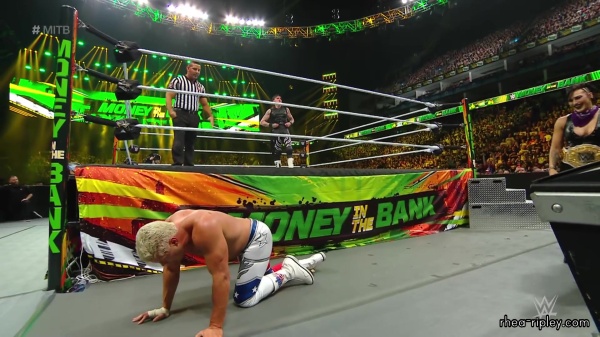 WWE_Money_In_The_Bank_2023_Rhea_Ringside_Attacks_Cody_1541.jpg