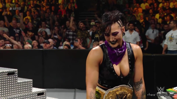 WWE_Money_In_The_Bank_2023_Rhea_Ringside_Attacks_Cody_1553.jpg