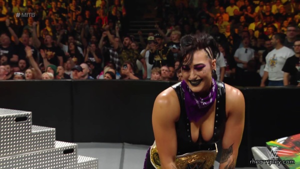 WWE_Money_In_The_Bank_2023_Rhea_Ringside_Attacks_Cody_1554.jpg