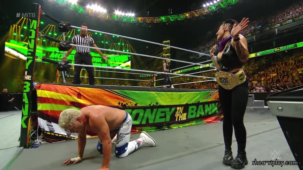 WWE_Money_In_The_Bank_2023_Rhea_Ringside_Attacks_Cody_1558.jpg