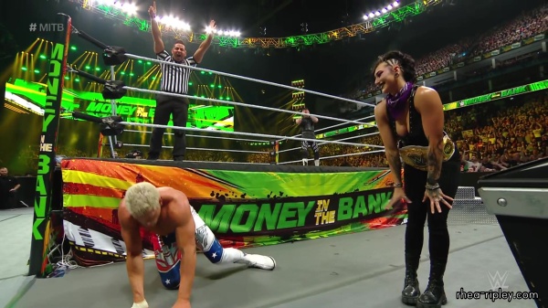 WWE_Money_In_The_Bank_2023_Rhea_Ringside_Attacks_Cody_1562.jpg