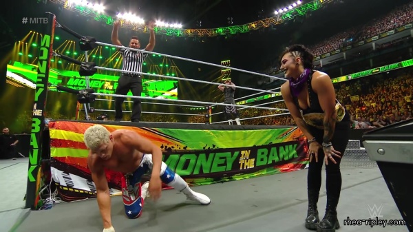 WWE_Money_In_The_Bank_2023_Rhea_Ringside_Attacks_Cody_1563.jpg