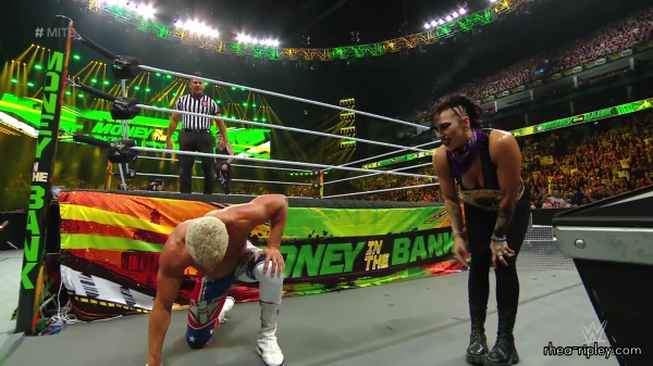 WWE_Money_In_The_Bank_2023_Rhea_Ringside_Attacks_Cody_1575.jpg