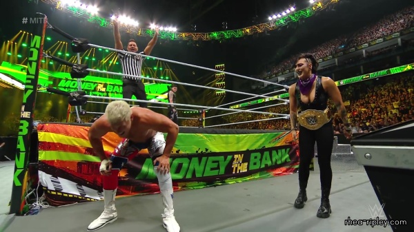 WWE_Money_In_The_Bank_2023_Rhea_Ringside_Attacks_Cody_1583.jpg