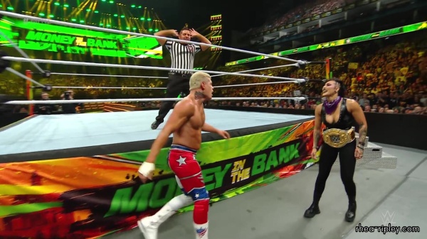 WWE_Money_In_The_Bank_2023_Rhea_Ringside_Attacks_Cody_1590.jpg
