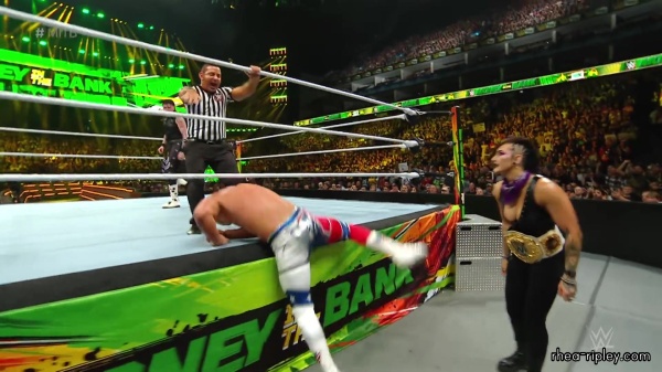 WWE_Money_In_The_Bank_2023_Rhea_Ringside_Attacks_Cody_1592.jpg