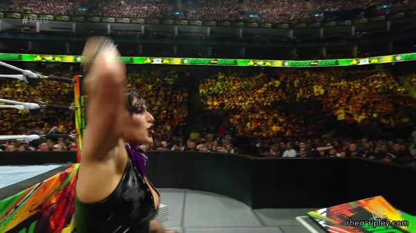 WWE_Money_In_The_Bank_2023_Rhea_Ringside_Attacks_Cody_1602.jpg