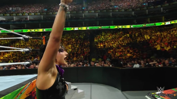 WWE_Money_In_The_Bank_2023_Rhea_Ringside_Attacks_Cody_1603.jpg
