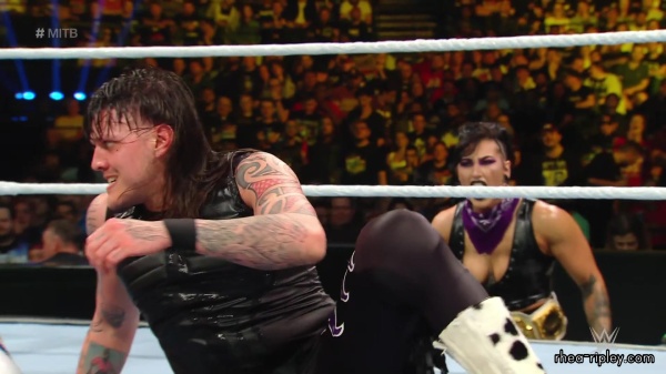WWE_Money_In_The_Bank_2023_Rhea_Ringside_Attacks_Cody_1609.jpg