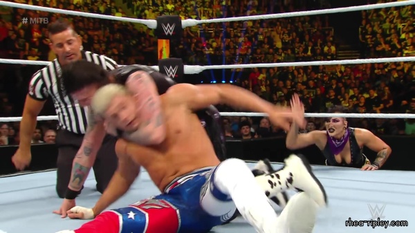 WWE_Money_In_The_Bank_2023_Rhea_Ringside_Attacks_Cody_1615.jpg