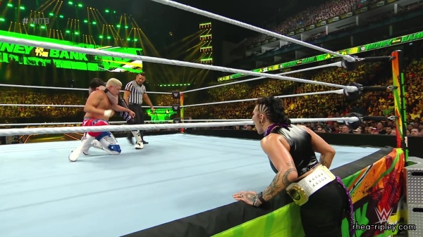 WWE_Money_In_The_Bank_2023_Rhea_Ringside_Attacks_Cody_1656.jpg
