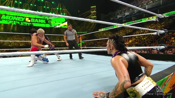 WWE_Money_In_The_Bank_2023_Rhea_Ringside_Attacks_Cody_1658.jpg