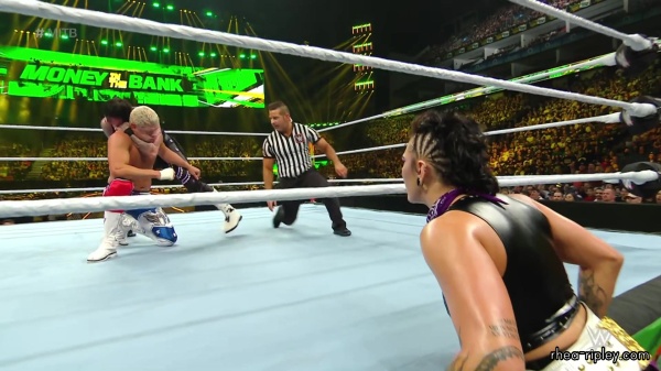WWE_Money_In_The_Bank_2023_Rhea_Ringside_Attacks_Cody_1659.jpg