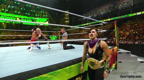 WWE_Money_In_The_Bank_2023_Rhea_Ringside_Attacks_Cody_1670.jpg