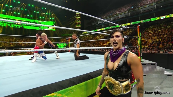 WWE_Money_In_The_Bank_2023_Rhea_Ringside_Attacks_Cody_1671.jpg