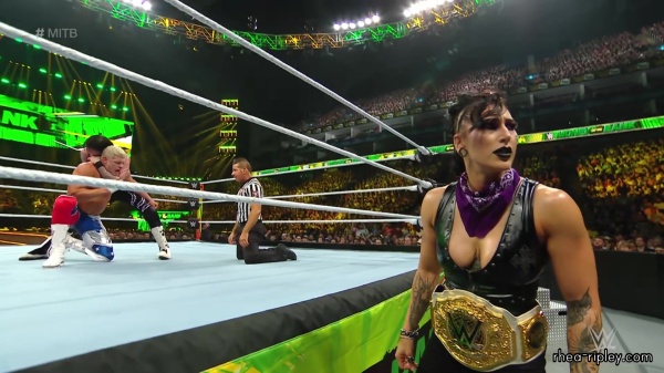 WWE_Money_In_The_Bank_2023_Rhea_Ringside_Attacks_Cody_1675.jpg