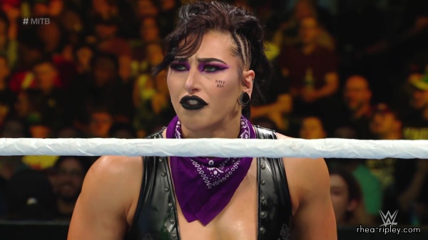 WWE_Money_In_The_Bank_2023_Rhea_Ringside_Attacks_Cody_1683.jpg