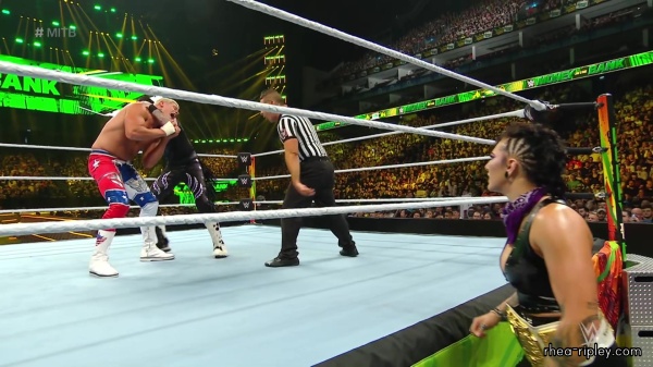 WWE_Money_In_The_Bank_2023_Rhea_Ringside_Attacks_Cody_1695.jpg