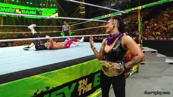 WWE_Money_In_The_Bank_2023_Rhea_Ringside_Attacks_Cody_1710.jpg