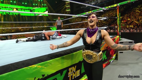 WWE_Money_In_The_Bank_2023_Rhea_Ringside_Attacks_Cody_1712.jpg
