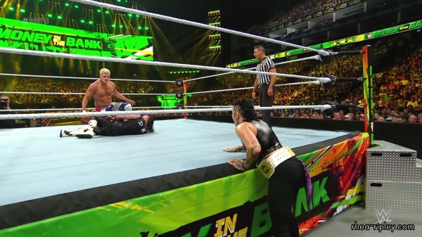 WWE_Money_In_The_Bank_2023_Rhea_Ringside_Attacks_Cody_1727.jpg