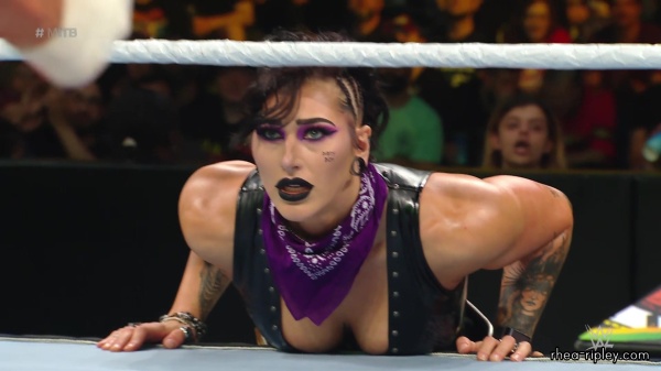 WWE_Money_In_The_Bank_2023_Rhea_Ringside_Attacks_Cody_1738.jpg
