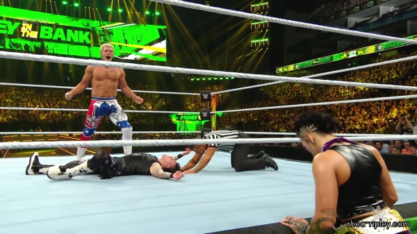 WWE_Money_In_The_Bank_2023_Rhea_Ringside_Attacks_Cody_1746.jpg