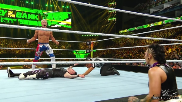 WWE_Money_In_The_Bank_2023_Rhea_Ringside_Attacks_Cody_1747.jpg