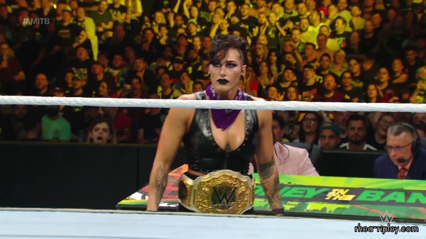 WWE_Money_In_The_Bank_2023_Rhea_Ringside_Attacks_Cody_1758.jpg