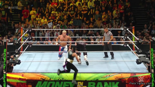 WWE_Money_In_The_Bank_2023_Rhea_Ringside_Attacks_Cody_1774.jpg