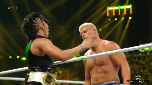 WWE_Money_In_The_Bank_2023_Rhea_Ringside_Attacks_Cody_1781.jpg