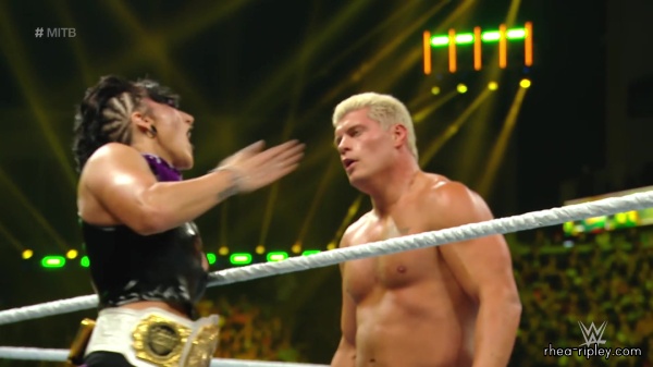 WWE_Money_In_The_Bank_2023_Rhea_Ringside_Attacks_Cody_1782.jpg