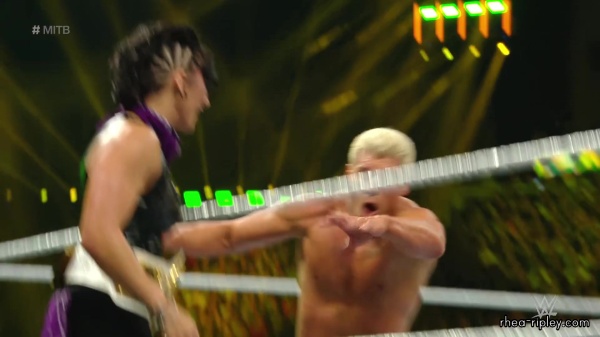 WWE_Money_In_The_Bank_2023_Rhea_Ringside_Attacks_Cody_1787.jpg