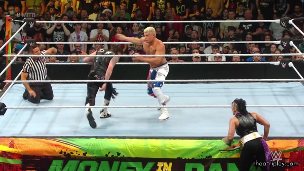 WWE_Money_In_The_Bank_2023_Rhea_Ringside_Attacks_Cody_1802.jpg
