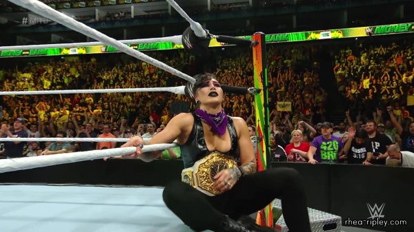 WWE_Money_In_The_Bank_2023_Rhea_Ringside_Attacks_Cody_1849.jpg