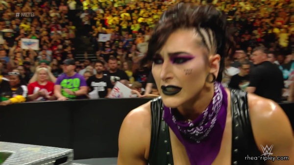 WWE_Money_In_The_Bank_2023_Rhea_Ringside_Attacks_Cody_1871.jpg