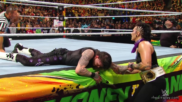 WWE_Money_In_The_Bank_2023_Rhea_Ringside_Attacks_Cody_1898.jpg